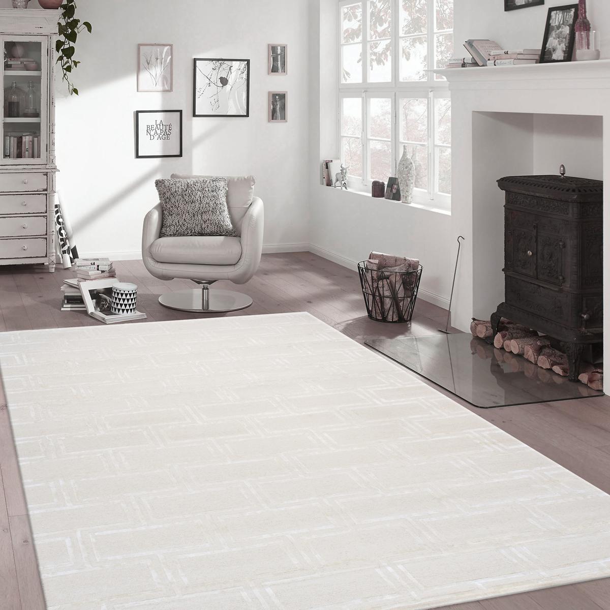 Edgy Hand-Tufted Ivory Transitional Area Rug
