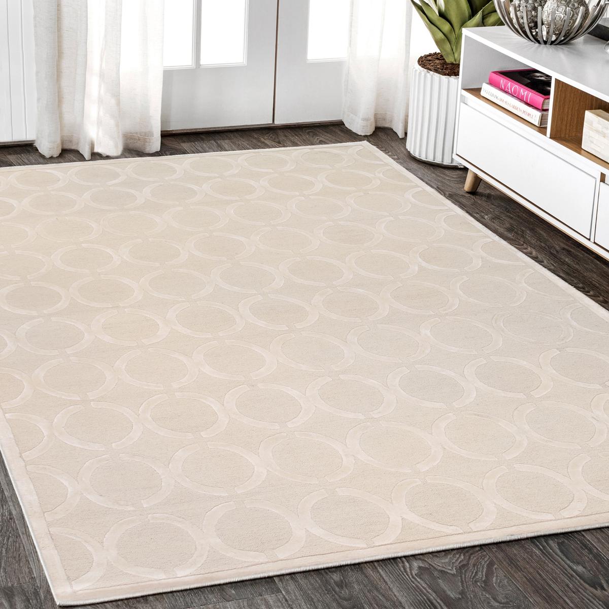 Edgy Hand-Tufted Ivory Transitional Area Rug