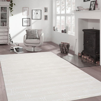 Edgy Hand-Tufted Ivory Transitional Area Rug
